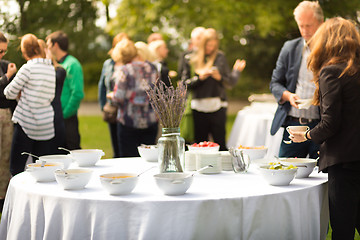 Image showing Banquet lunch break at conference meeting on hotel terrace.