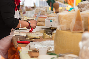 Image showing Cheese market. Large selection of cheeses.