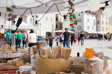 Image showing Cheese market. Large selection of cheeses.