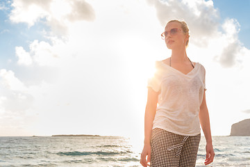 Image showing Relaxed Happy Woman Enjoying Sun on Vacations.