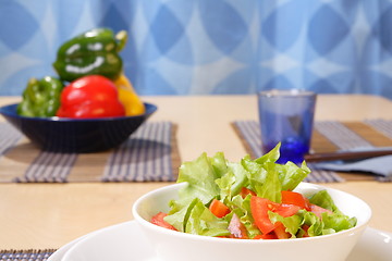 Image showing Table with salad bowls