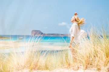 Image showing Free Happy Woman Enjoying Sun on Vacations.