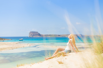 Image showing Relaxed Happy Woman Enjoying Sun on Vacations.