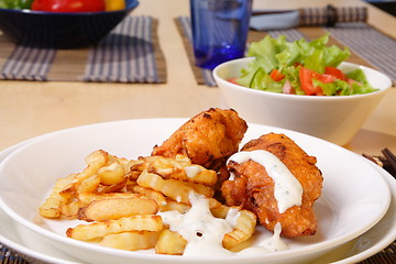 Image showing French fries and chicken