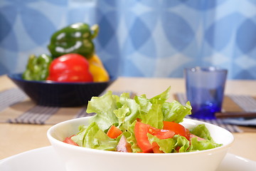 Image showing Table with salad bowls