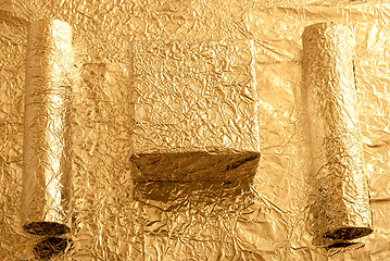 Image showing Gold foil figures