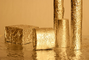 Image showing Gold foil figures