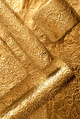 Image showing Gold foil figures