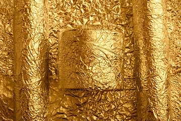 Image showing Gold foil figures