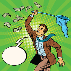 Image showing Businessman catching money with a butterfly net and said