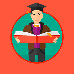 Image showing Graduate with book in hands.