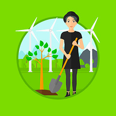 Image showing Woman plants tree.