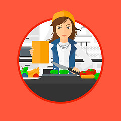 Image showing Woman cooking healthy vegetable salad.