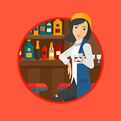 Image showing Woman sitting at the bar counter.