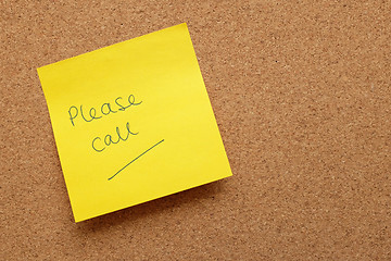 Image showing Yellow sticky note - Please Call - on cork board