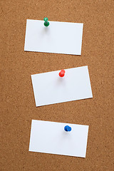 Image showing Three blank cards pinned to a cork board