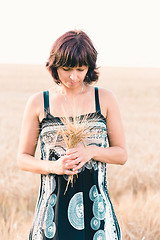 Image showing Middle aged beauty woman in barley field