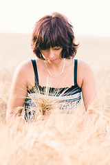 Image showing Middle aged beauty woman in barley field