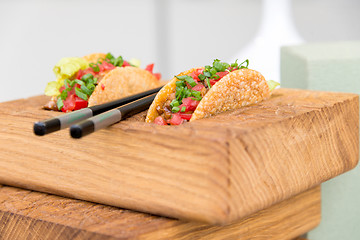 Image showing fresh mexican taco shells with beef and vegetables