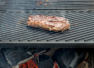 Image showing beef steaks on the grill