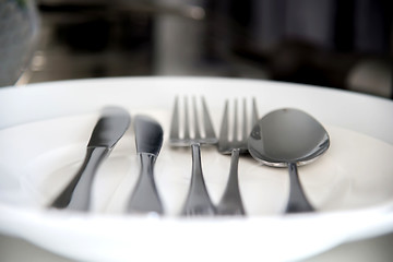 Image showing Fork, Spoon and Table Knife on the white background