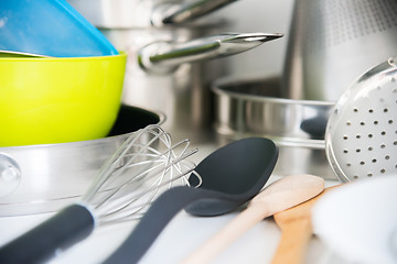 Image showing Various tableware on shelf in the kitchen