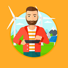 Image showing Male worker of solar power plant and wind farm.