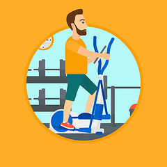 Image showing Man exercising on elliptical trainer.