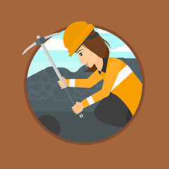 Image showing Miner working with pickaxe.