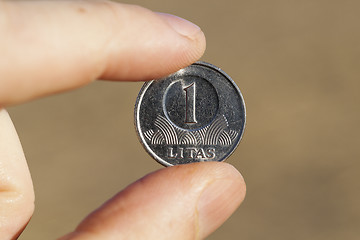 Image showing coin in hand  