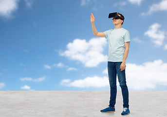 Image showing happy man in virtual reality headset or 3d glasses