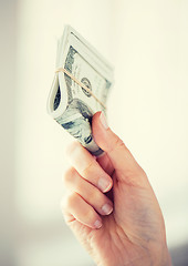 Image showing close up of woman hands holding us dollar money