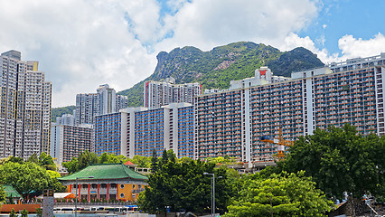 Image showing hong kong public estate with landmark lion rock