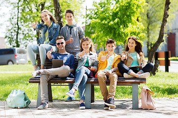 Image showing group of students with tablet pc at school yard