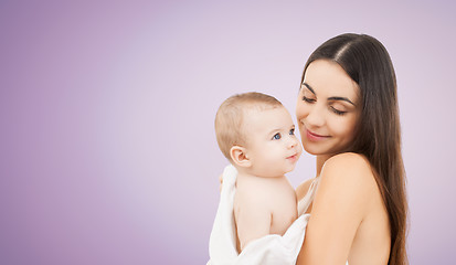 Image showing happy mother holding adorable baby