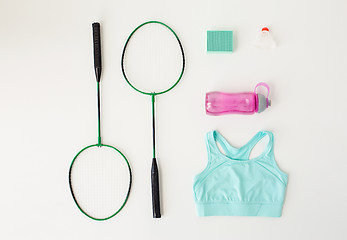 Image showing close up of badminton rackets with sports stuff