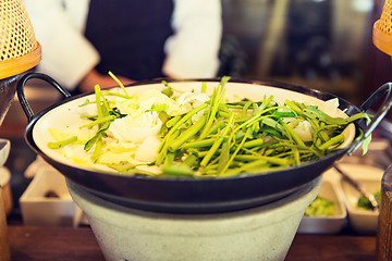 Image showing bowl of green salad or garnish at asian restaurant
