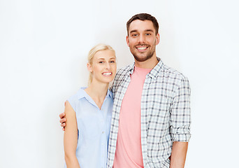 Image showing smiling couple hugging