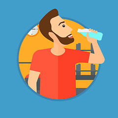 Image showing Sportive man drinking water.