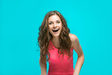 Image showing The young woman\'s portrait with happy emotions