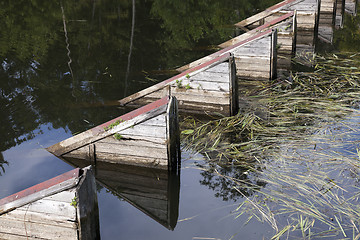 Image showing old leaking dam  