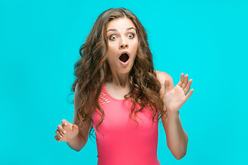 Image showing Portrait of young woman with shocked facial expression