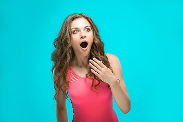 Image showing Portrait of young woman with shocked facial expression