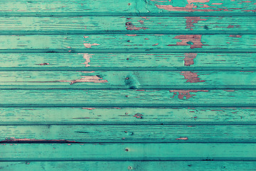 Image showing old wooden boards painted in blue background