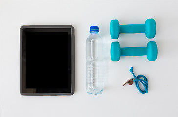 Image showing tablet pc, dumbbells, whistle and water bottle