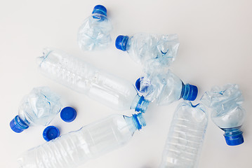 Image showing close up of empty used plastic bottles on table