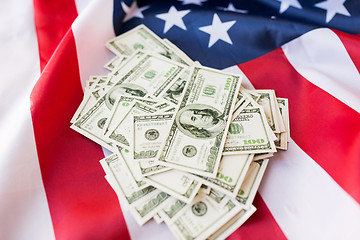 Image showing close up of american flag and dollar cash money