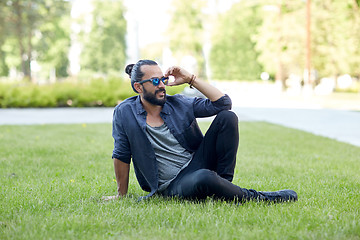 Image showing man in sunglasses at city street or park