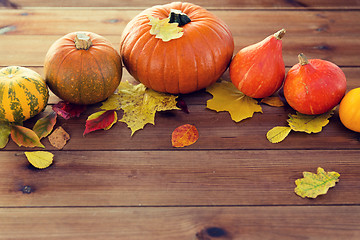 Image showing close up of pumpkins on wooden table at home