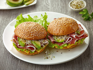 Image showing breakfast sandwiches with smoked meat and avocado